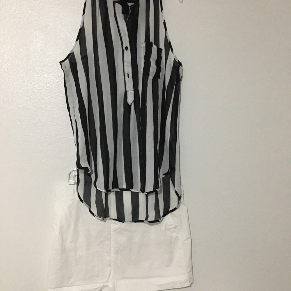 White and black blouse with a white mini skirt
